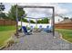 Cozy fire pit area with comfortable seating, perfect for outdoor gatherings and relaxing evenings at 9051 Country Barn Ct, Charlotte, NC 28273