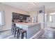 Stylish kitchen with a large island, granite countertops, stainless steel appliances, and modern finishes at 9051 Country Barn Ct, Charlotte, NC 28273