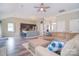 Cozy living room with a kitchen view and a large sectional sofa at 9051 Country Barn Ct, Charlotte, NC 28273