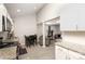 Efficient kitchen with granite countertops open to the living room with a breakfast table at 92 Saint Charles Ne Ave, Concord, NC 28025