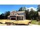 Charming two-story home with a two-car garage and inviting front porch at 9945 Cask Way, Huntersville, NC 28078