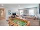 Fun game room with a foosball table and comfortable seating area at 9945 Cask Way, Huntersville, NC 28078