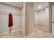 Large walk-in closet with wire shelving and carpet, giving residents ample storage space at 9945 Cask Way, Huntersville, NC 28078
