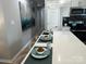 A sleek kitchen with a long quartz countertop island and a modern design at 1004 Johnson St, Charlotte, NC 28206