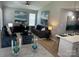 Open-concept layout featuring a modern living room flowing into the kitchen and dining area at 1004 Johnson St, Charlotte, NC 28206