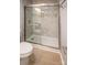 Modern tiled shower with glass enclosure and stylish fixtures, providing a luxurious feel at 1004 Johnson St, Charlotte, NC 28206