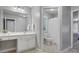 Clean bathroom with white vanity, mirror, and toilet with shower at 1014 Harrogate Ln, Matthews, NC 28104