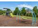 Well-equipped community playground with slides, swings, and climbing structures, perfect for Gathering fun at 1014 Harrogate Ln, Matthews, NC 28104