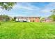 Large backyard with deck and lush green lawn at 109 Ashley St, Shelby, NC 28150
