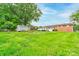 The backyard has a well-maintained lawn and storage shed at 109 Ashley St, Shelby, NC 28150