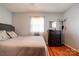 Comfortable bedroom featuring a large window, hardwood floors, and ample space at 109 Ashley St, Shelby, NC 28150