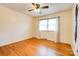 Clean, bright bedroom with hardwood floors, neutral walls, and abundant sunlight from a window at 109 Ashley St, Shelby, NC 28150
