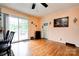 Bright dining room featuring hardwood floors, sliding glass door leading to a deck, and neutral wall color at 109 Ashley St, Shelby, NC 28150