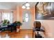 Inviting foyer with hardwood floors, elegant lighting, and decorative accents creating a warm ambiance at 109 Ashley St, Shelby, NC 28150