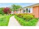 Brick home with front bay window and landscaped walkway at 109 Ashley St, Shelby, NC 28150