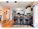 Stylish eat-in kitchen featuring a breakfast bar, stainless steel appliances, and white cabinetry at 109 Ashley St, Shelby, NC 28150