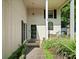 Inviting front porch with bench seating and charming details at 11121 Sevilla Ct, Charlotte, NC 28226