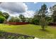 Expansive, well-maintained backyard featuring a lush lawn and secure fencing at 112 Brookshire Dr, Fort Mill, SC 29715