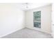 Neutral bedroom featuring plush carpet and a bright window at 112 Brookshire Dr, Fort Mill, SC 29715