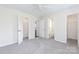 Bright bedroom with plush carpet and access to multiple closets and an en suite bathroom at 112 Brookshire Dr, Fort Mill, SC 29715