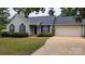 Charming single Gathering home with landscaped front yard and attached two car garage at 112 Brookshire Dr, Fort Mill, SC 29715