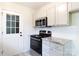 Updated kitchen featuring granite countertops, subway tile backsplash, and stainless appliances at 112 Brookshire Dr, Fort Mill, SC 29715