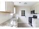 Bright kitchen featuring white cabinets, granite countertops, and stainless steel appliances at 112 Brookshire Dr, Fort Mill, SC 29715