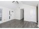 Spacious living room showcasing vinyl flooring, vaulted ceilings, and a front door at 112 Brookshire Dr, Fort Mill, SC 29715