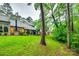 Well-manicured backyard highlighting the home's outdoor living spaces and natural surroundings, promoting privacy at 115 Pine Grove Cir, Clover, SC 29710