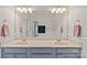 Bathroom features double sinks, ample counter space, and classic neutral finishes at 1200 Rutledge Ave, Charlotte, NC 28211