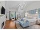 The main bedroom includes a fireplace, seating, hardwood floors, and lots of natural light at 1200 Rutledge Ave, Charlotte, NC 28211