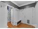 Functional mudroom features built-in storage, coat hooks, and a dog door, perfect for organizing outdoor gear at 1200 Rutledge Ave, Charlotte, NC 28211
