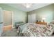 A well-lit bedroom featuring a closet, window with shutters, cozy decor, and carpeted floors at 12039 Lawings Corner Dr, Huntersville, NC 28078