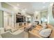 Spacious living room with hardwood floors, fireplace, and open layout perfect for entertaining at 12039 Lawings Corner Dr, Huntersville, NC 28078