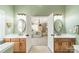 Ensuite bathroom offers dual vanities, spacious layout, and is connected to the primary bedroom at 12039 Lawings Corner Dr, Huntersville, NC 28078