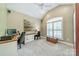 Comfortable home office features built-in desk, neutral paint, and ample natural light from the large window at 12039 Lawings Corner Dr, Huntersville, NC 28078