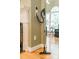 Convenient central vacuum system integrated into the wall near an elegant fireplace at 12039 Lawings Corner Dr, Huntersville, NC 28078