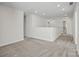 Hallway with neutral walls and carpet, providing access to various rooms at 15020 Meadows Hunt Ln # 159, Huntersville, NC 28078