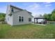 Backyard with a gazebo, a manicured lawn, and a two-story home at 16337 Greybriar Forest Ln, Charlotte, NC 28278