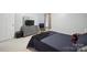 Bedroom with a queen bed, closet, and furniture at 16337 Greybriar Forest Ln, Charlotte, NC 28278
