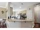 Open kitchen featuring a breakfast bar and stainless steel appliances at 16337 Greybriar Forest Ln, Charlotte, NC 28278
