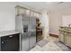 Spacious kitchen featuring stainless steel appliances, oven, and granite countertops at 16337 Greybriar Forest Ln, Charlotte, NC 28278