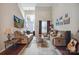 Bright living room with hardwood floors, high ceilings, and natural light at 16337 Greybriar Forest Ln, Charlotte, NC 28278
