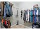 Well-organized walk-in closet with ample shelving and hanging space for storage at 16337 Greybriar Forest Ln, Charlotte, NC 28278