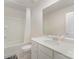 Bathroom featuring tub with white shower curtain and modern vanity with a sink at 18026 Stark Way, Charlotte, NC 28278