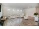 Spacious living room with hardwood floors and neutral tones, offering a relaxing atmosphere at 18026 Stark Way, Charlotte, NC 28278