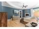 Spacious main bedroom features recessed ceiling, gas fireplace, and hardwood floors at 18207 Shearer Rd, Davidson, NC 28036