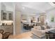 Open-concept kitchen and living space features a large island, pendant lighting, and hardwood floors at 18207 Shearer Rd, Davidson, NC 28036