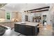 Bright kitchen island with stone countertops, custom cabinets, a modern faucet, and stainless appliances at 18207 Shearer Rd, Davidson, NC 28036