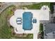 A bird's eye view of the gorgeous pool and patio area that also features a fire pit and lounge chairs at 18207 Shearer Rd, Davidson, NC 28036